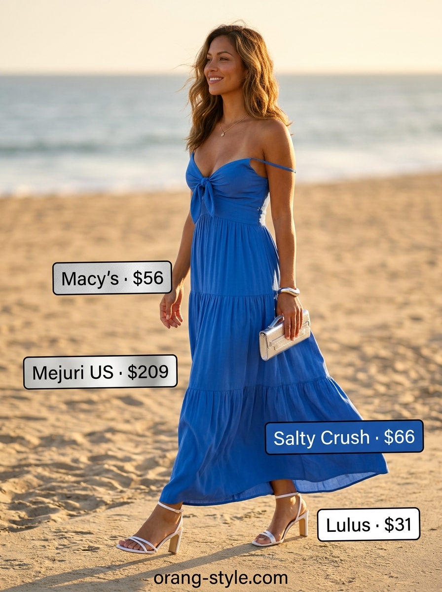 Elegant coastal summer beach outfit for women 2026: Cobalt blue maxi dress with silver accessories and heeled sandals.