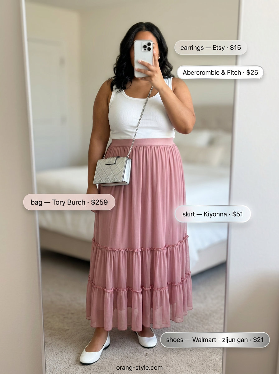 Blush pink tiered midi skirt outfit for colorful plus size summer outfits for women 2026. Romantic feminine style.