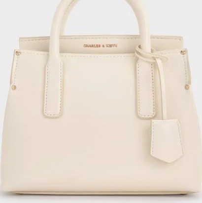 bag Charles & Keith Rene Structured Top Handle Bag charleskeith.com $103