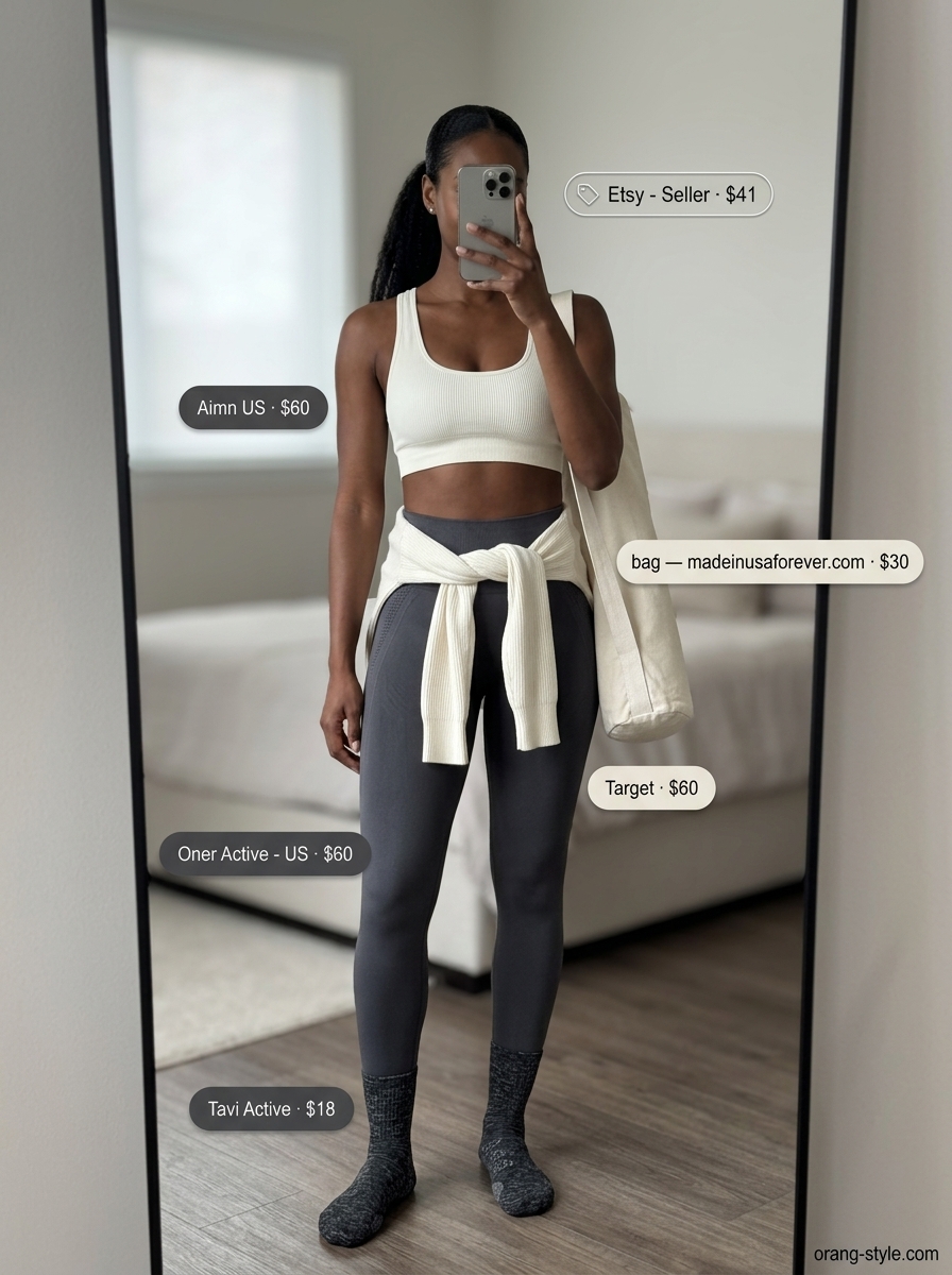 Trendy summer activewear for women 2026: Charcoal gray seamless ribbed set with ivory wrap cardigan for yoga.