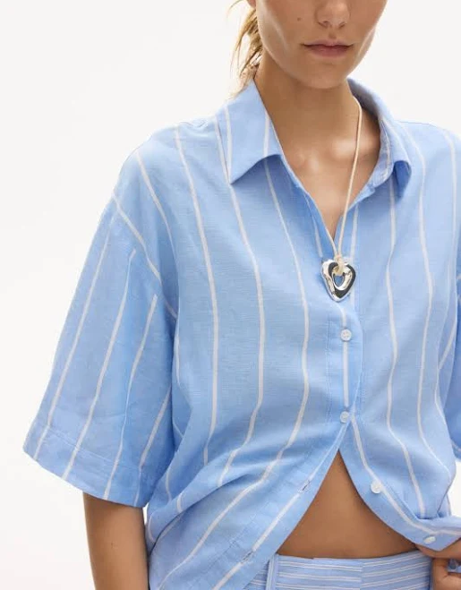 top Ladies H&M Light Blue/Striped Oversized linen-blend shirt H&M $24.99