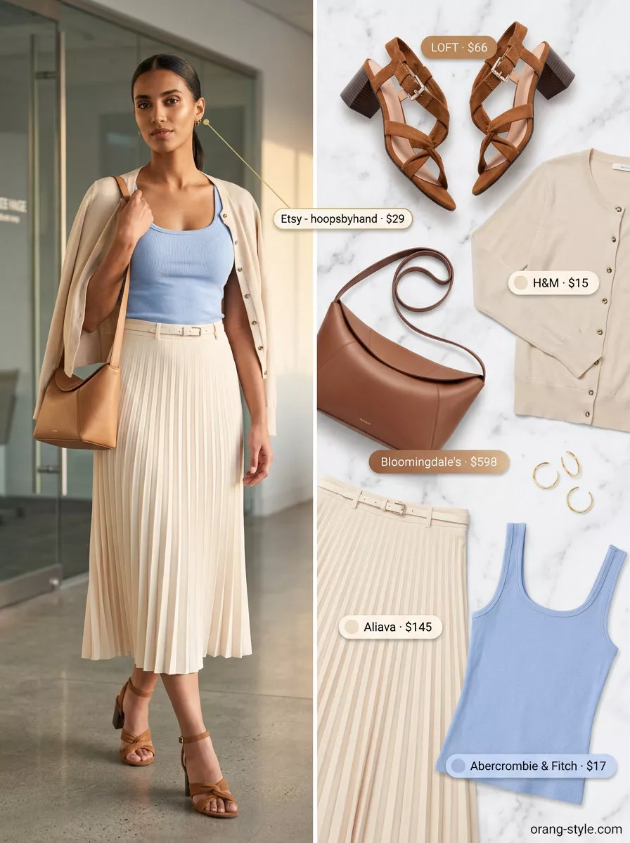Breathable summer business casual outfit for women 2026: Cream midi skirt, light blue knit top, tan sandals.