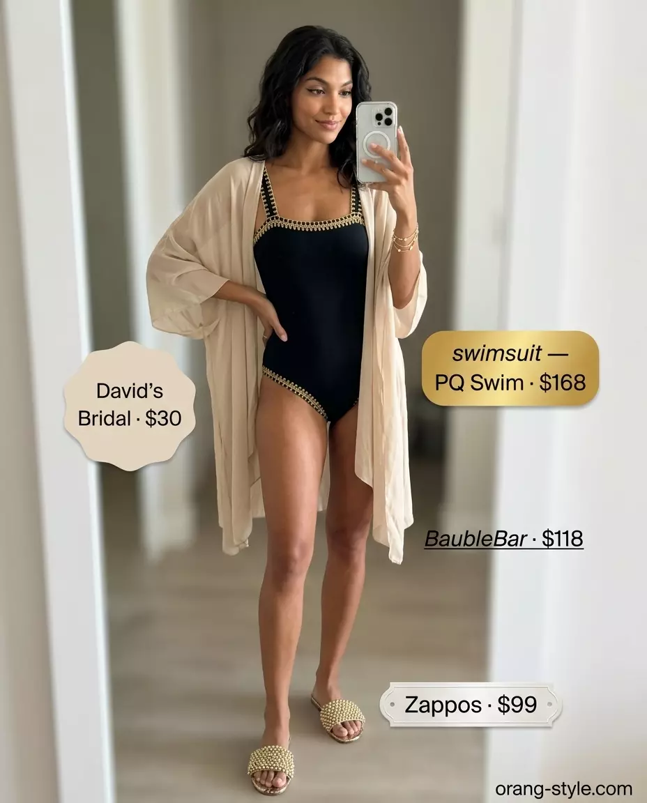 Chic crochet summer pool party outfits 2026: Black swimsuit with cream sarong, straw bag, gold sandals & jewelry.