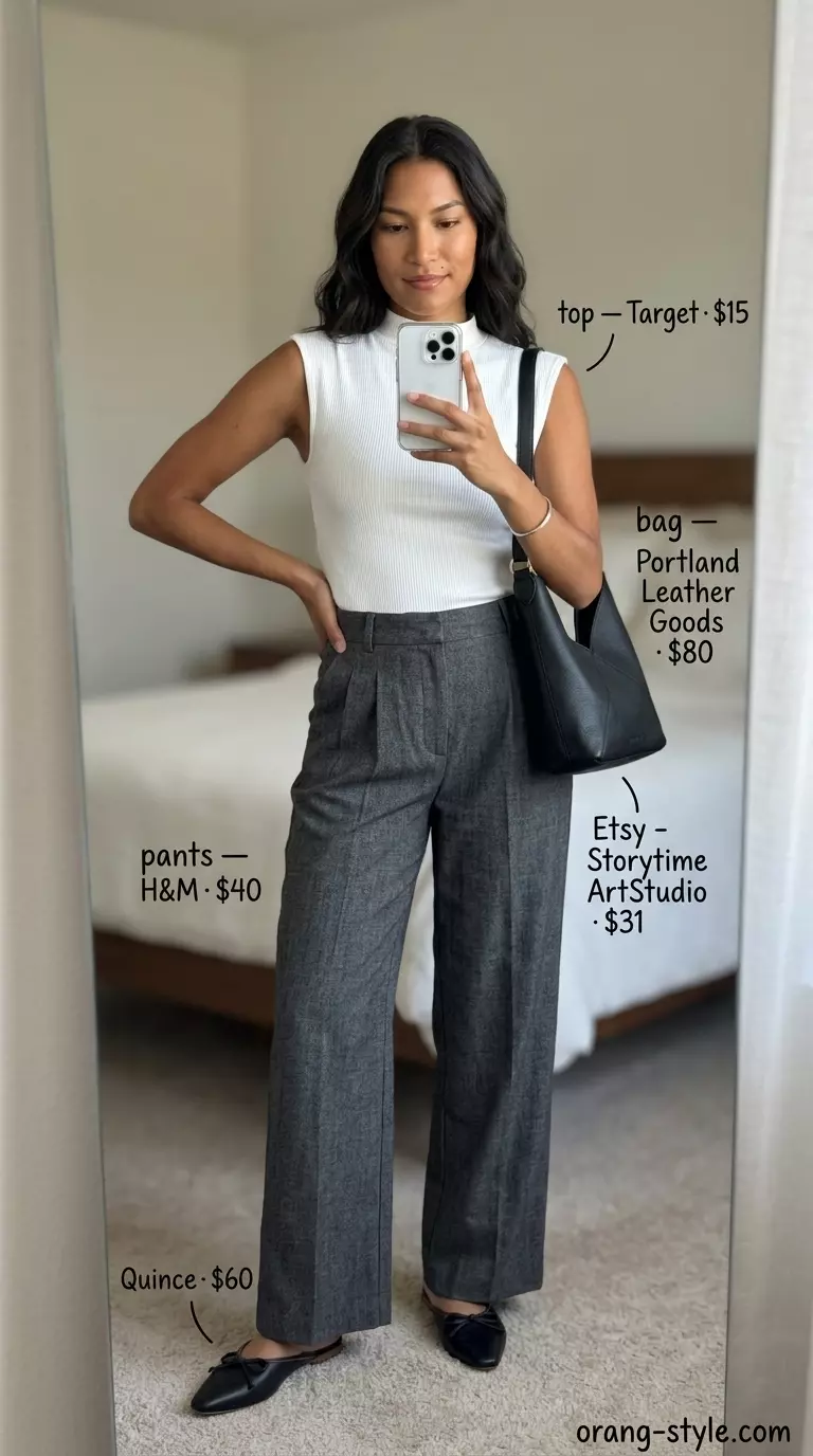 Timeless quiet luxury charcoal wide-leg trousers and white knit top for summer 2026. Chic for smart casual & travel.