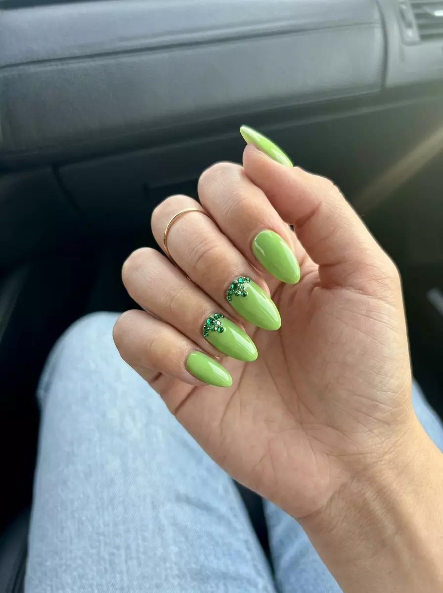 Emerald Sparkle Accents Nails 2026 Emerald Sparkle Accents nails in vibrant lime green with emerald green rhinestones for chic colourful summer nails 2026.