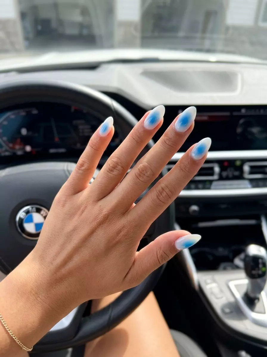 Summer Sky Aura Milky Nails 2026 Summer Sky Aura Milky nails with a white base and cerulean blue aura for sophisticated colourful summer nails 2026.