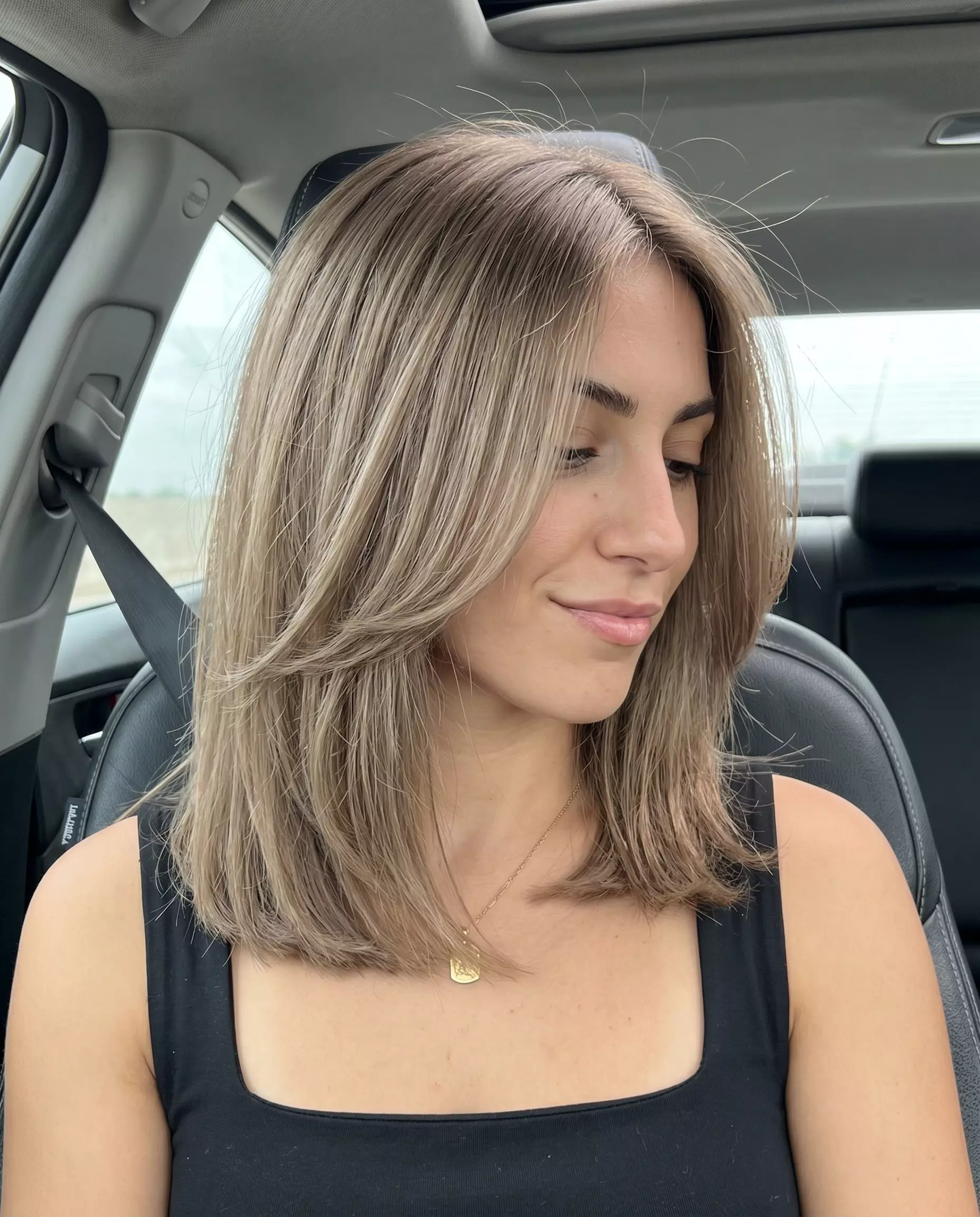 shoulder-length cool linen brown hair with U-shaped layers, no bangs, for professional events