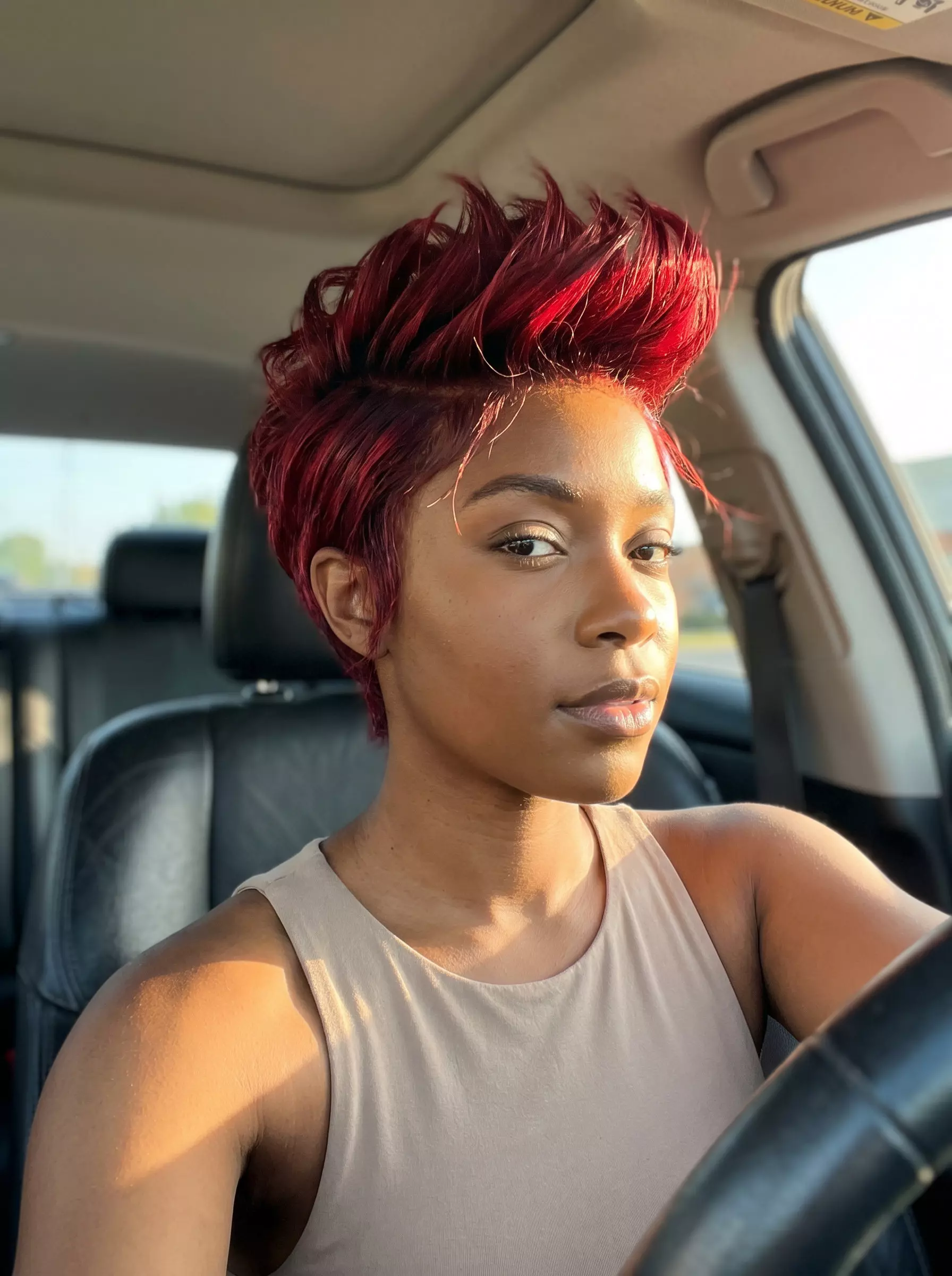 Crimson Red Spiky Crop Haircut 2026 short crimson red spiky crop haircut with textured layers and sharp spikes for festival