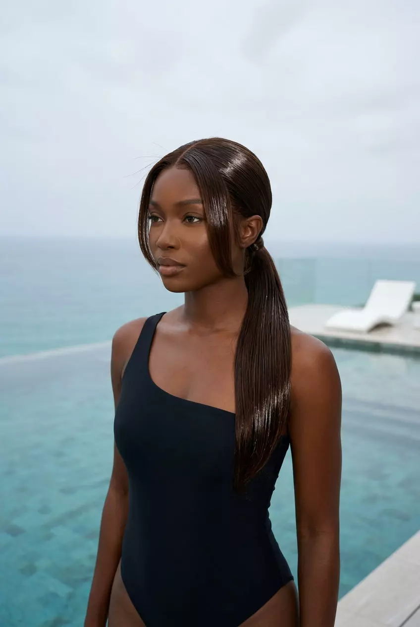 Sleek Espresso Roast Ponytail 2026 medium-length espresso roast brunette ponytail with razored perimeter and minimal face-framing for a sleek, modern look