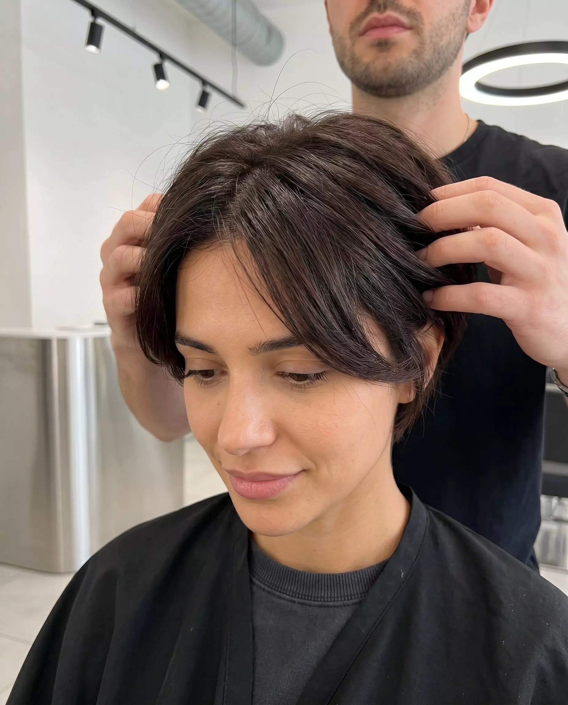 Deep Brunette Pixie Cut 2026 short espresso pixie haircut with tapered sides and textured top for a minimalist look