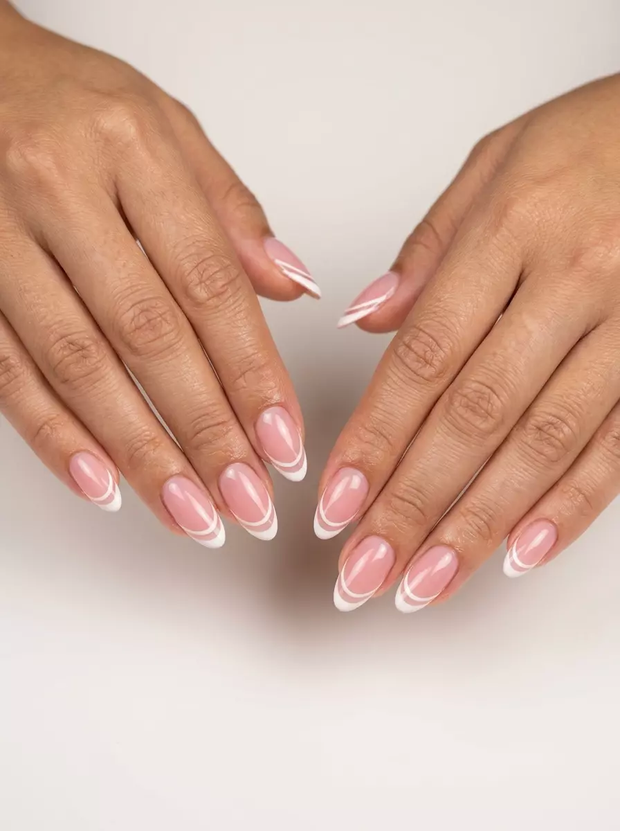 Sheer Pink Double Line French 2026 Modern sheer pink double line French manicure for work or summer brunch, 2026.