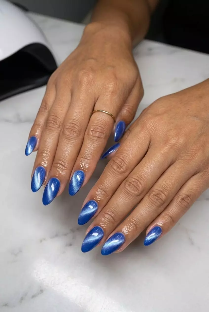 Cobalt Blue Cat-Eye Manicure 2026 Cobalt blue cat-eye manicure, magnetic shimmer shift. June manicure ideas - summer trends 2026.