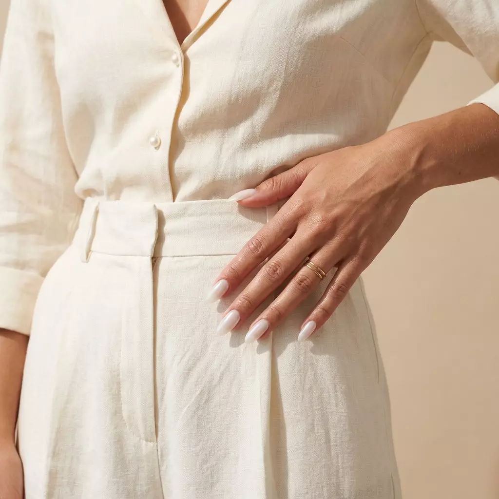 Milky White Jelly Nails 2026 | Effortless Chic Milky White Jelly Almond Glaze nails: Sheer milky white with pearlescent sheen. Effortless for daily wear. June nails ideas - summer ideas 2026.