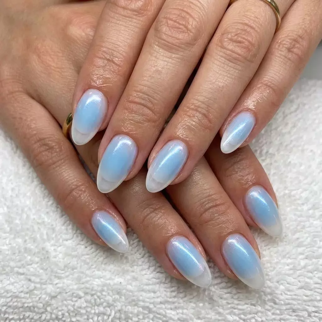 Sky Blue Aura French Manicure Colors Summer 2026 Sky Blue Aura French nails, an ethereal and romantic manicure color for summer 2026 weddings.