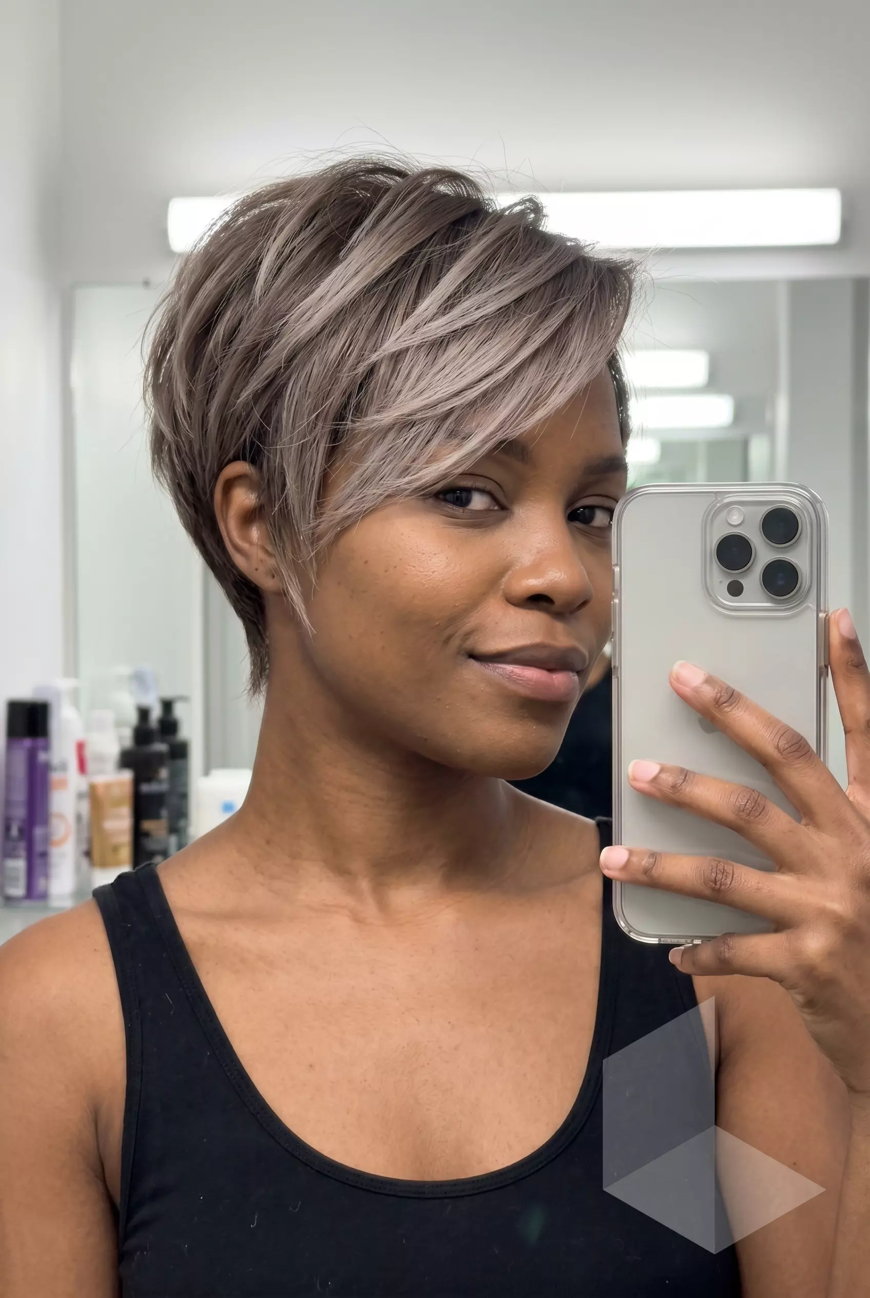 short pixie haircut ombre with mushroom brown to ash blonde, razored layers, swept bangs &mdash; edgy and modern