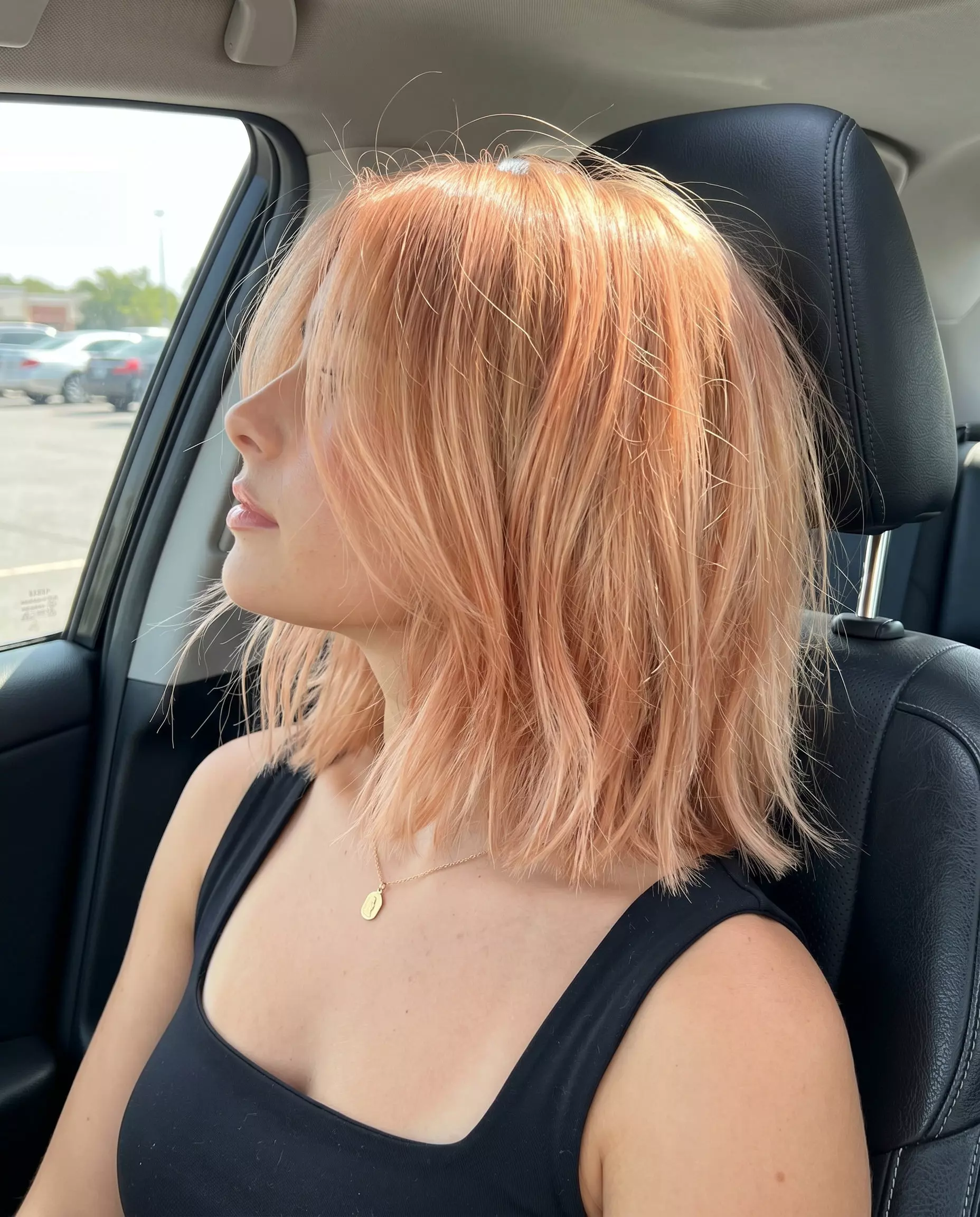Nectarine Glaze Lob 2026: Textured & Playful shoulder-length nectarine glaze lob with choppy textured layers, no bangs — playful romantic style