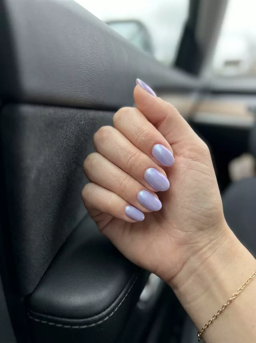 Lavender Haze Shimmer Oval Nails 2026 Lavender haze shimmer oval nails for oval summer nails 2026. Romantic style for weddings and date nights.