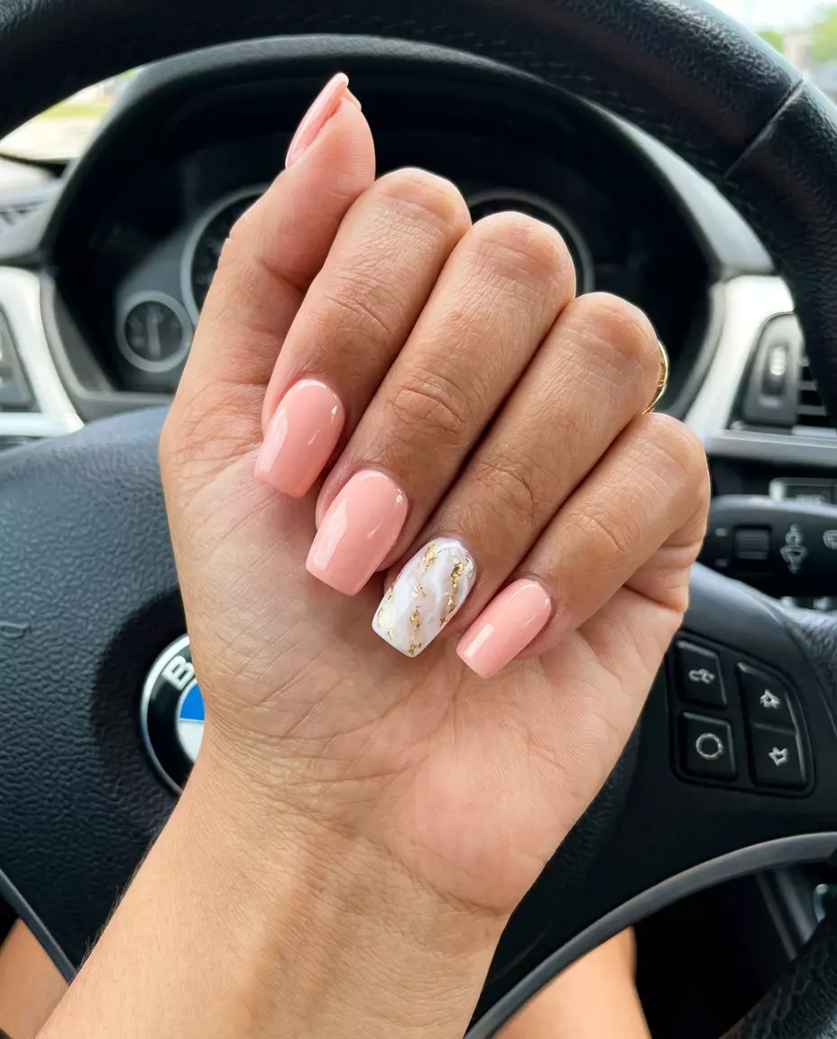 Artistic Peach Pink Marble Nails 2026 Artistic peach pink marble nails for vacation or art gallery visits. Pink summer nails 2026.