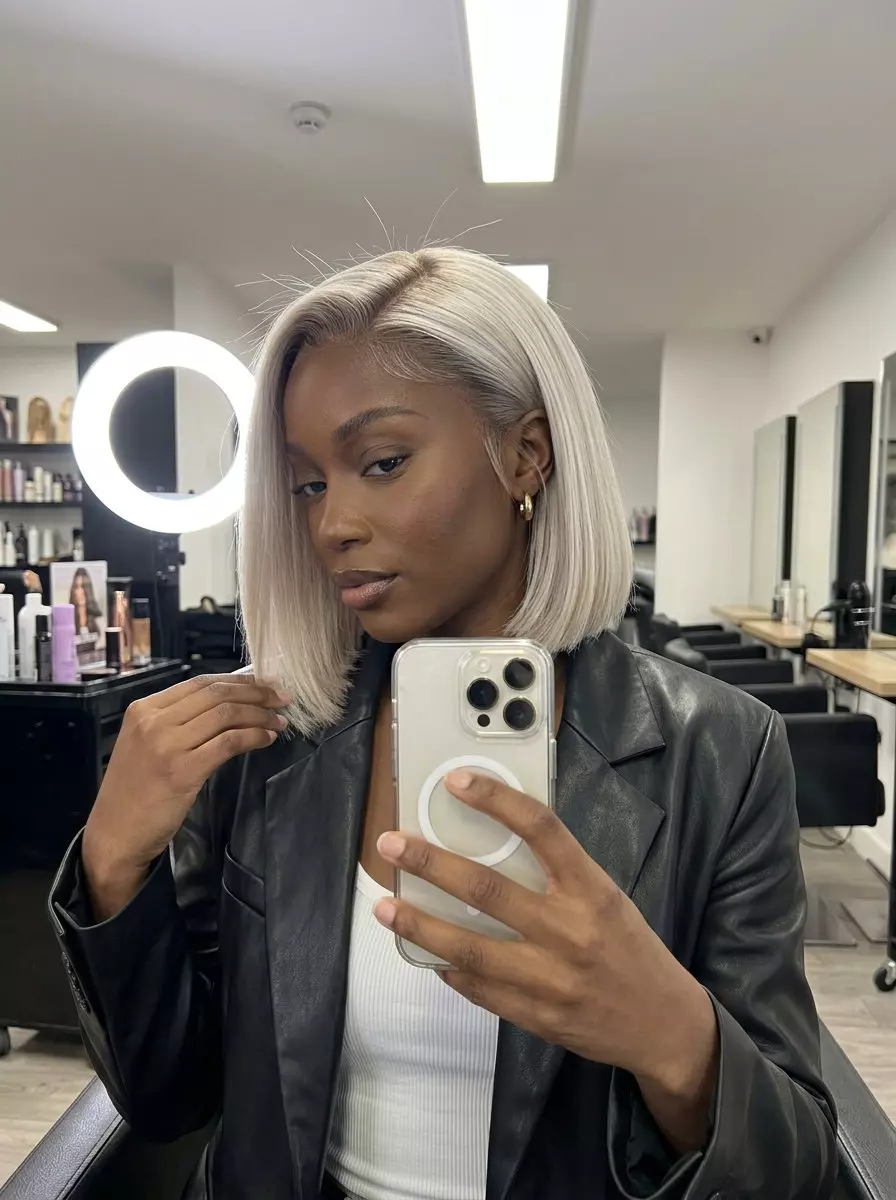 Sculpted Summer Bob 2026 chin-length platinum blonde bob with ash root shadow and pearl tone for minimalist chic