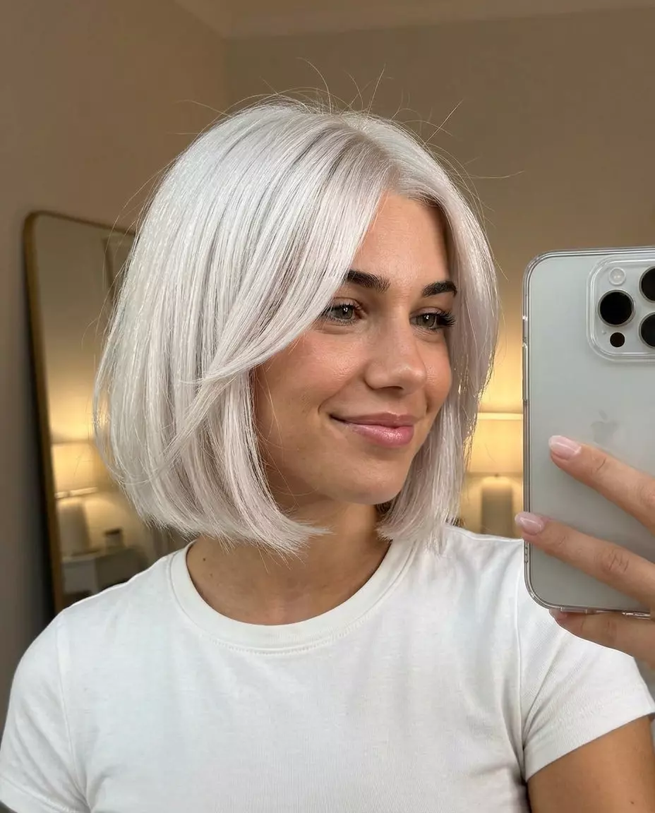 Platinum Retro Bob 2026 chin-length platinum blonde bob with soft texture and pearl undertones for retro chic