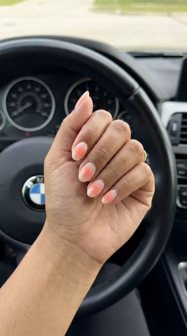Light Coral Aura Sheen: Short Oval Summer Nails 2026 Short oval summer nails 2026: Light Coral Aura Sheen for festivals and summer vacations.
