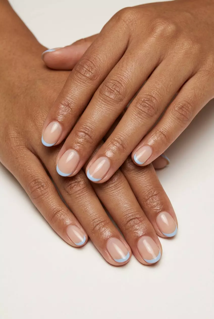 Pale Blue French Oval Nails 2026 Chic pale blue micro French accent short oval summer nails 2026, ideal for minimalist everyday style.