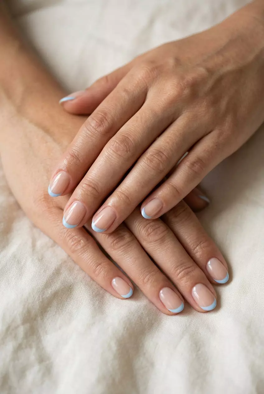Pale Blue Micro French: Short Oval Summer Nails 2026 Short oval summer nails 2026: Pale Blue Micro French for minimalist style and work.