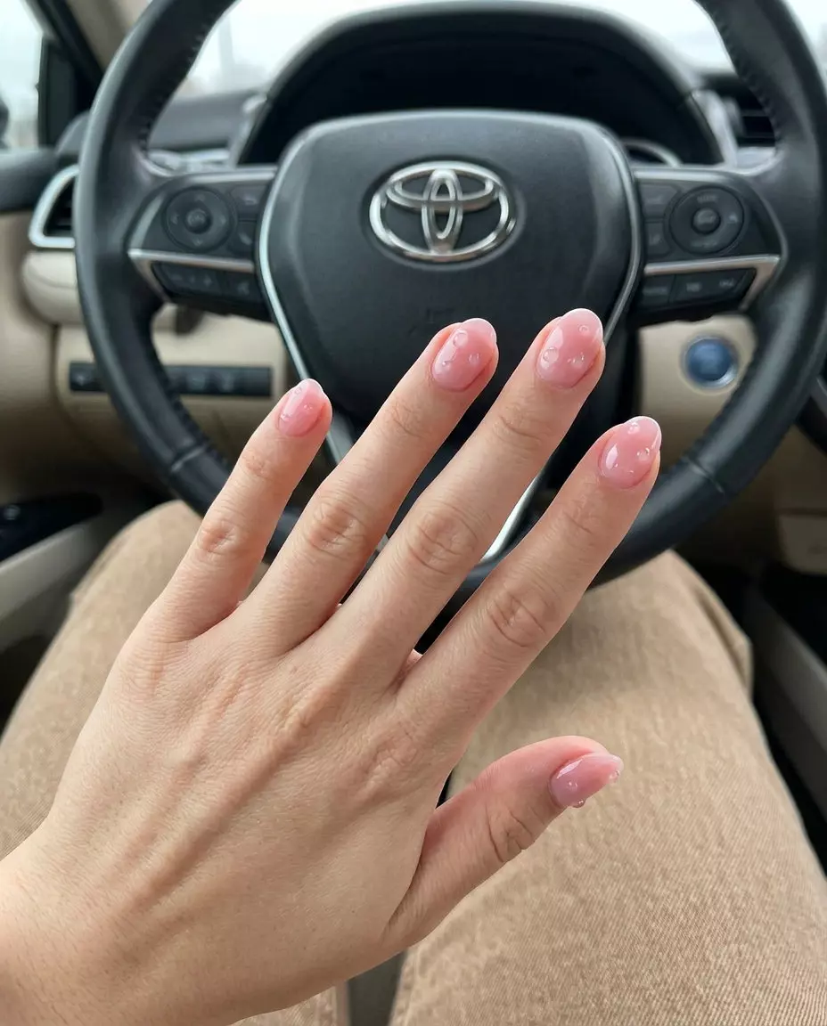 Sheer Pink Dew Drops: Short Oval Summer Nails 2026 Short oval summer nails 2026: Sheer Pink Dew Drops for weddings and romantic occasions.