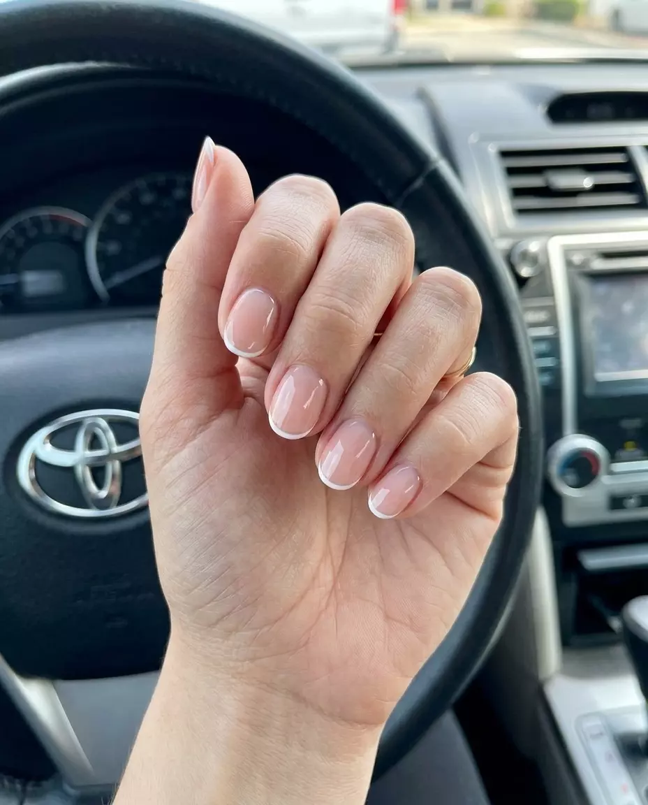 Nude Sheer French Tip Oval Nails 2026: Professional Style Nude Sheer French Tip Oval nails: minimalist, sophisticated look for daily wear and professional settings in 2026.