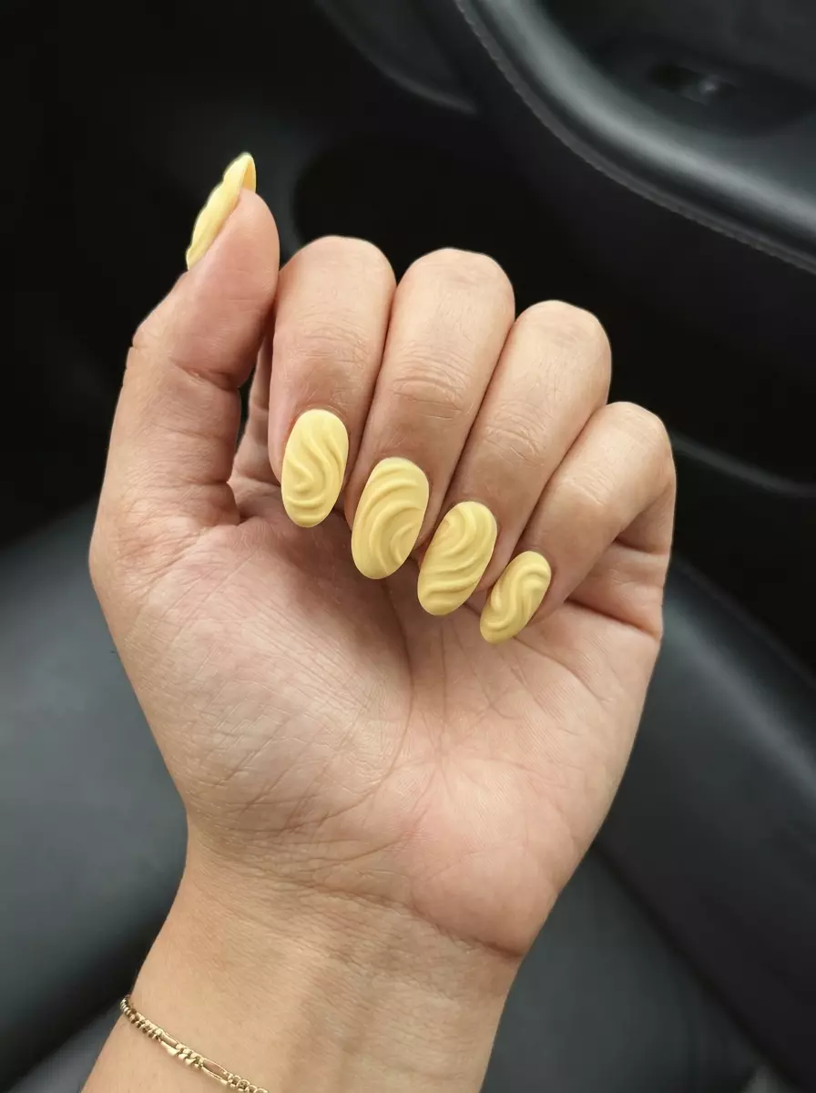 Textured Sunshine Butter Yellow Nails 2026 Textured Sunshine Butter Yellow Acrylics: Playful summer acrylic oval nails 2026 for brunch.