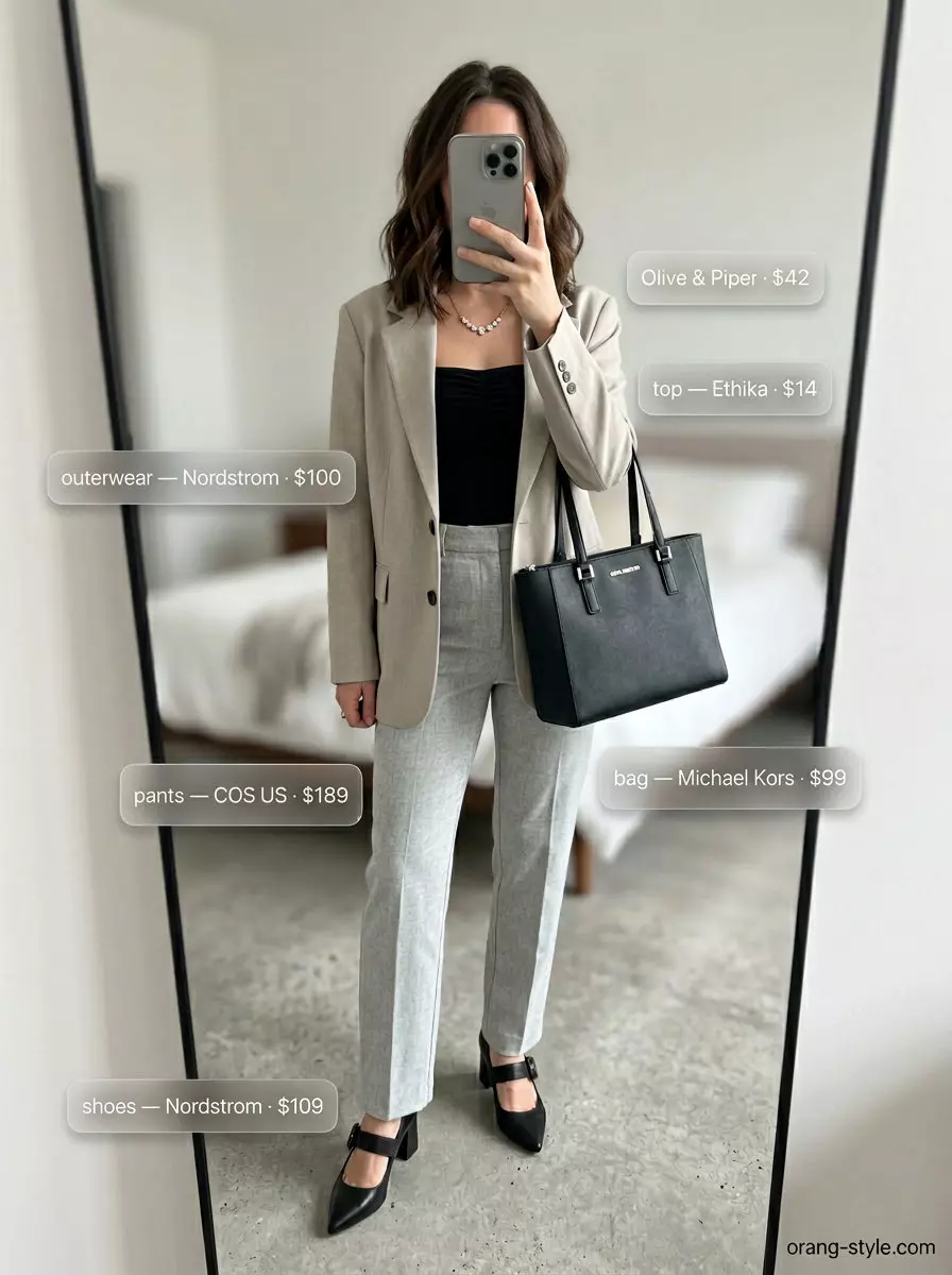 Minimalist black bandeau top with beige blazer and trousers for modern workwear in summer 2026.