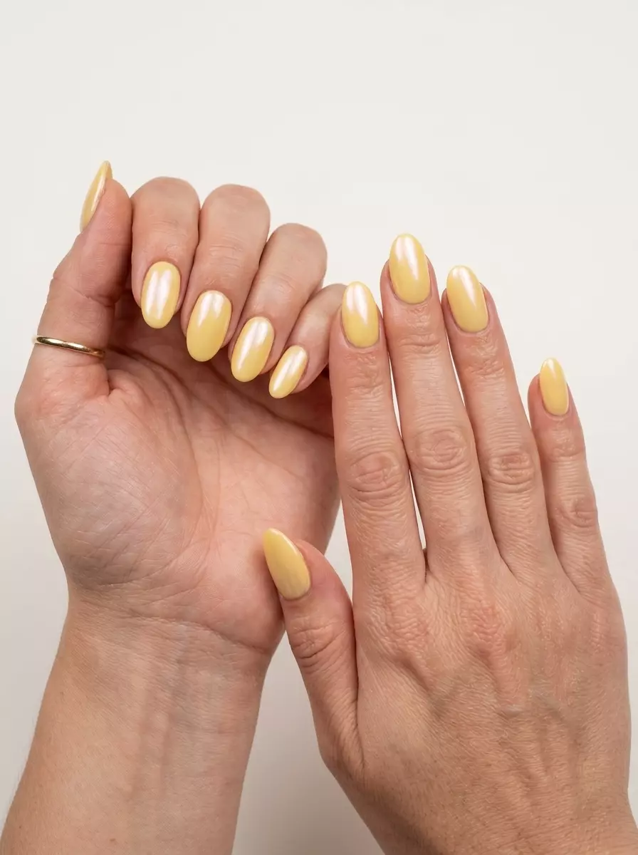 Butter Yellow Glazed Donut Nails 2026: Casual Birthday Butter yellow glazed donut nails for summer birthday nails 2026. Clean-girl, radiant, subtle short squoval nails.