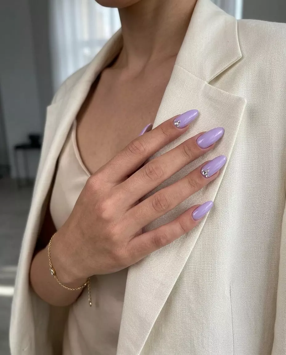 Lavender Rhinestone Nails 2026 | Glamorous Birthday Sparkling lavender nails with rhinestone accents for summer birthday nails 2026. Glamorous, feminine formal event style.
