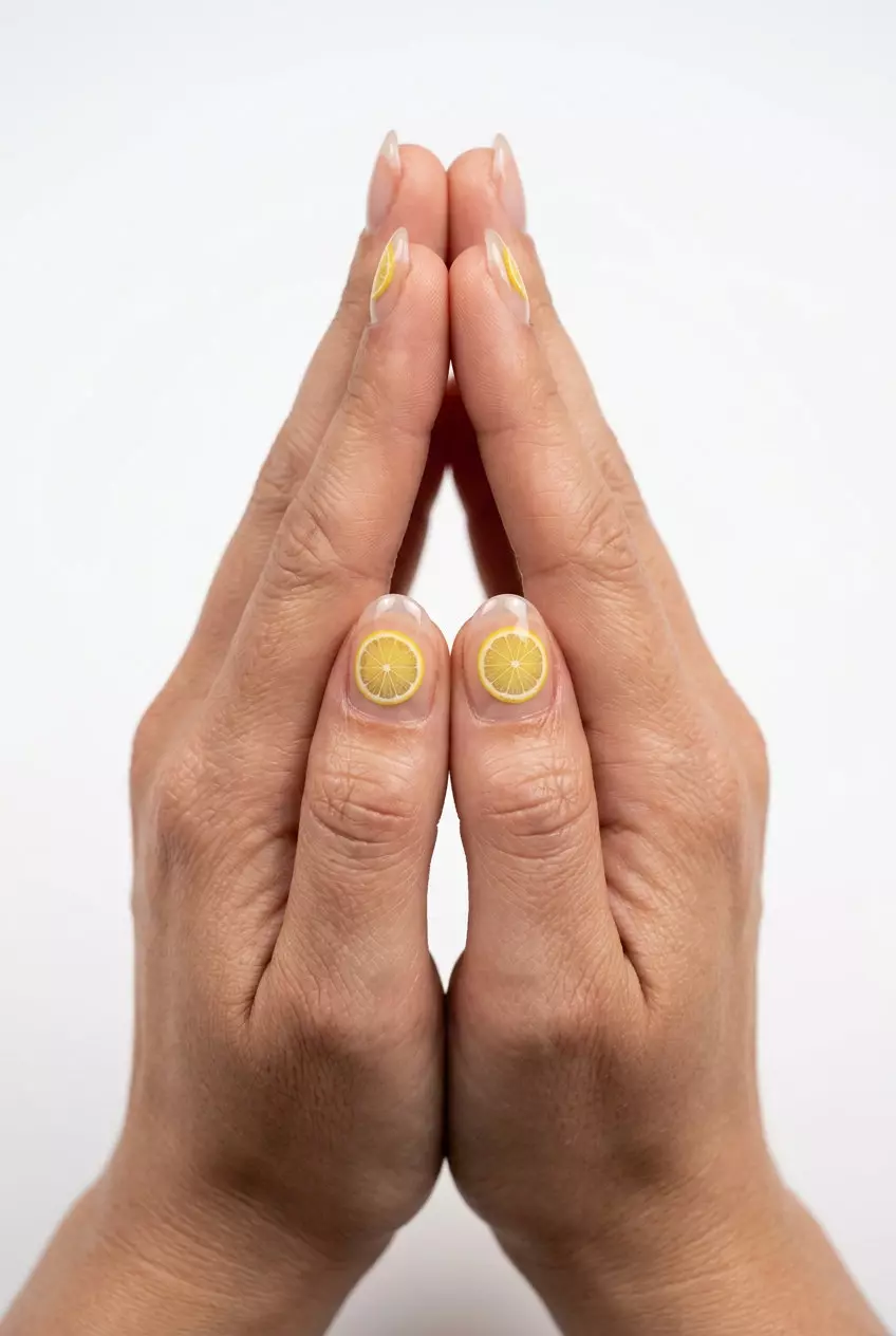 Summer Citrus Nail Art 2026: Negative Space Lemon Accents Minimalist Negative Space Lemon Accents for summer citrus nail art 2026. Chic date night nails with clear and yellow.
