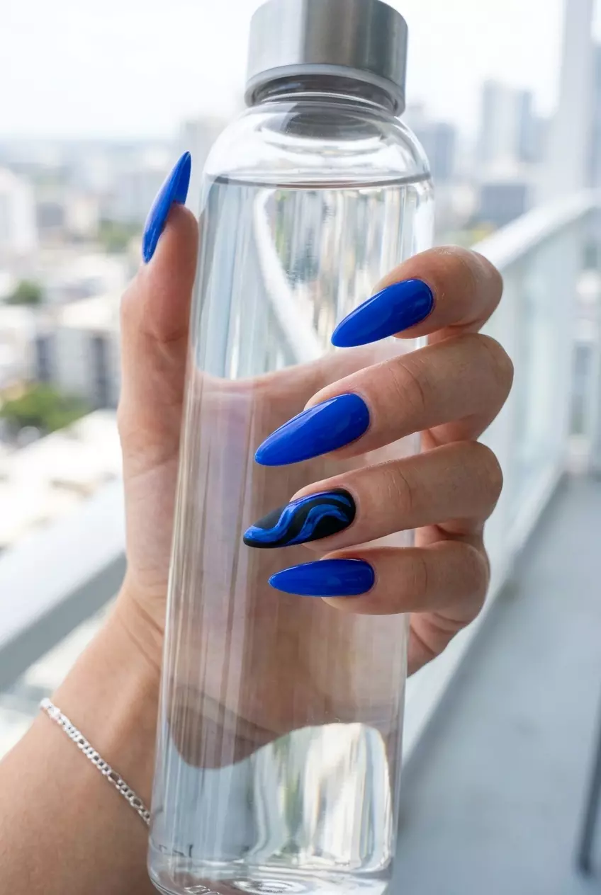 Midnight Chrome Swirl nails for summer holiday nails 2026: edgy, dramatic party look.