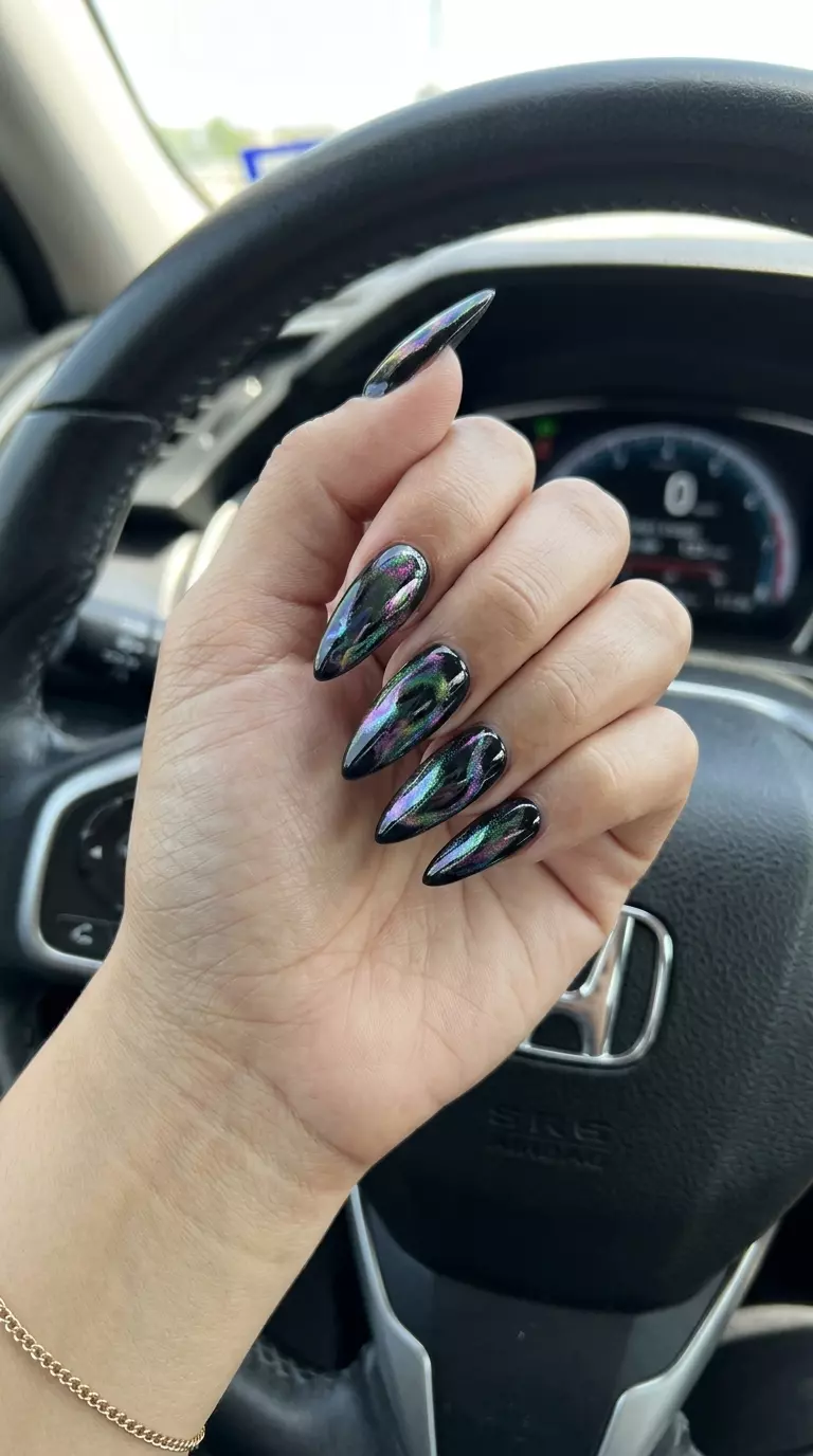 Cosmic Oil Slick Nails 2026 | Edgy Party Look Cosmic Oil Slick Coffin nails for summer inspired nails 2026. Edgy iridescent shifting colors on long coffin.