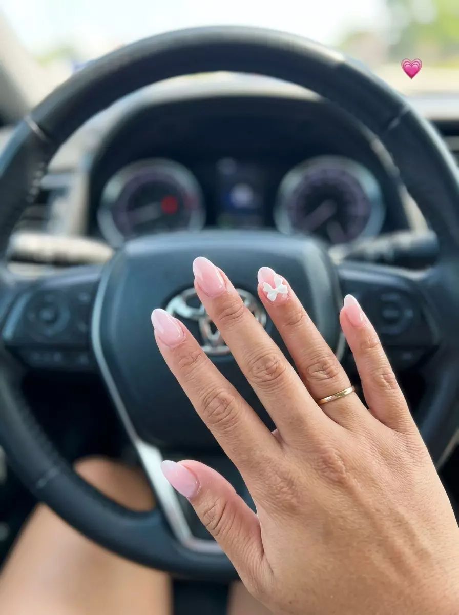 Milky Pink 3D Bows Nails 2026 Whimsical Milky Pink 3D Bows nails for summer inspired nails 2026. Playful and feminine date night style.
