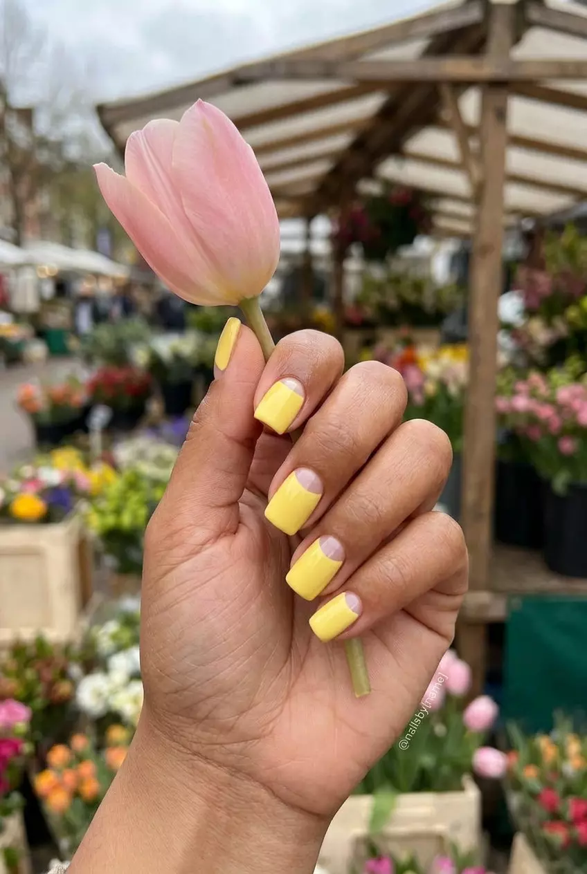 Butter Yellow Negative Space: Modern summer nail colors 2026 for work or casual. Bright yellow art.