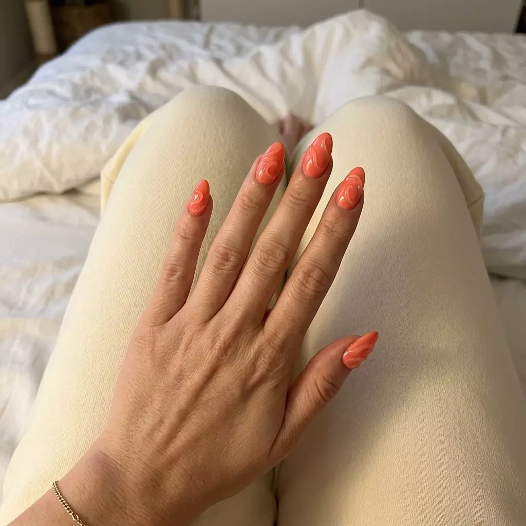 Summer Nail Manicure Ideas 2026: Beachy Textured Coral Swirls Beachy textured coral swirls nails for summer nail manicure ideas 2026. Playful, vibrant, artistic.
