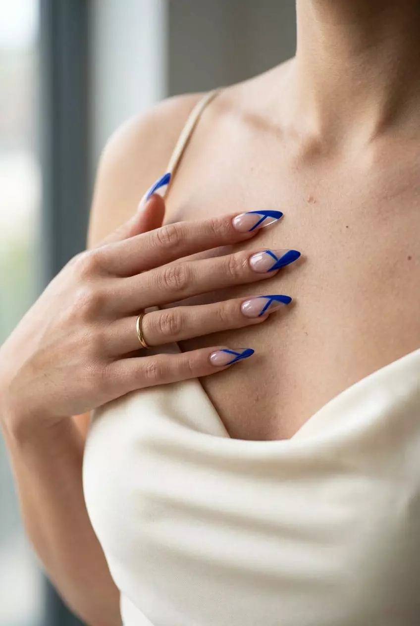 Cobalt blue negative space lines summer nails 2026 for night out, fashion event. Edgy art.
