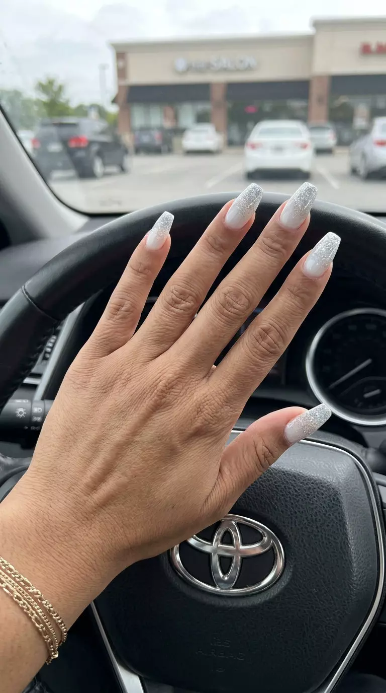 White Glitter Fade Sparkle nails for summer nails 2026: white with silver glitter gradient.