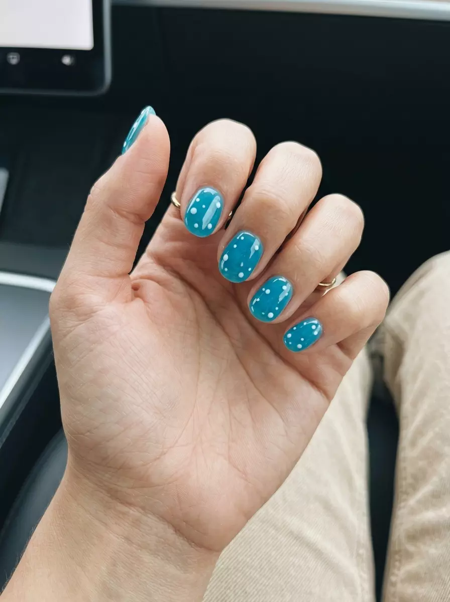 Polka Dot Jelly Sea Nails 2026 Polka Dot Jelly Sea nails for summer nails beach vibes 2026. Fun ocean blue jelly with white dots for beach vacation.