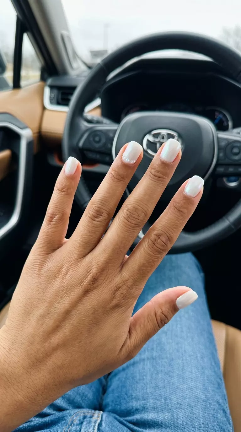Seafoam Pearl Squoval Accents Nails 2026 Seafoam Pearl Squoval Accents nails for summer nails beach vibes 2026. Clean soft white with pearl details for daily wear.