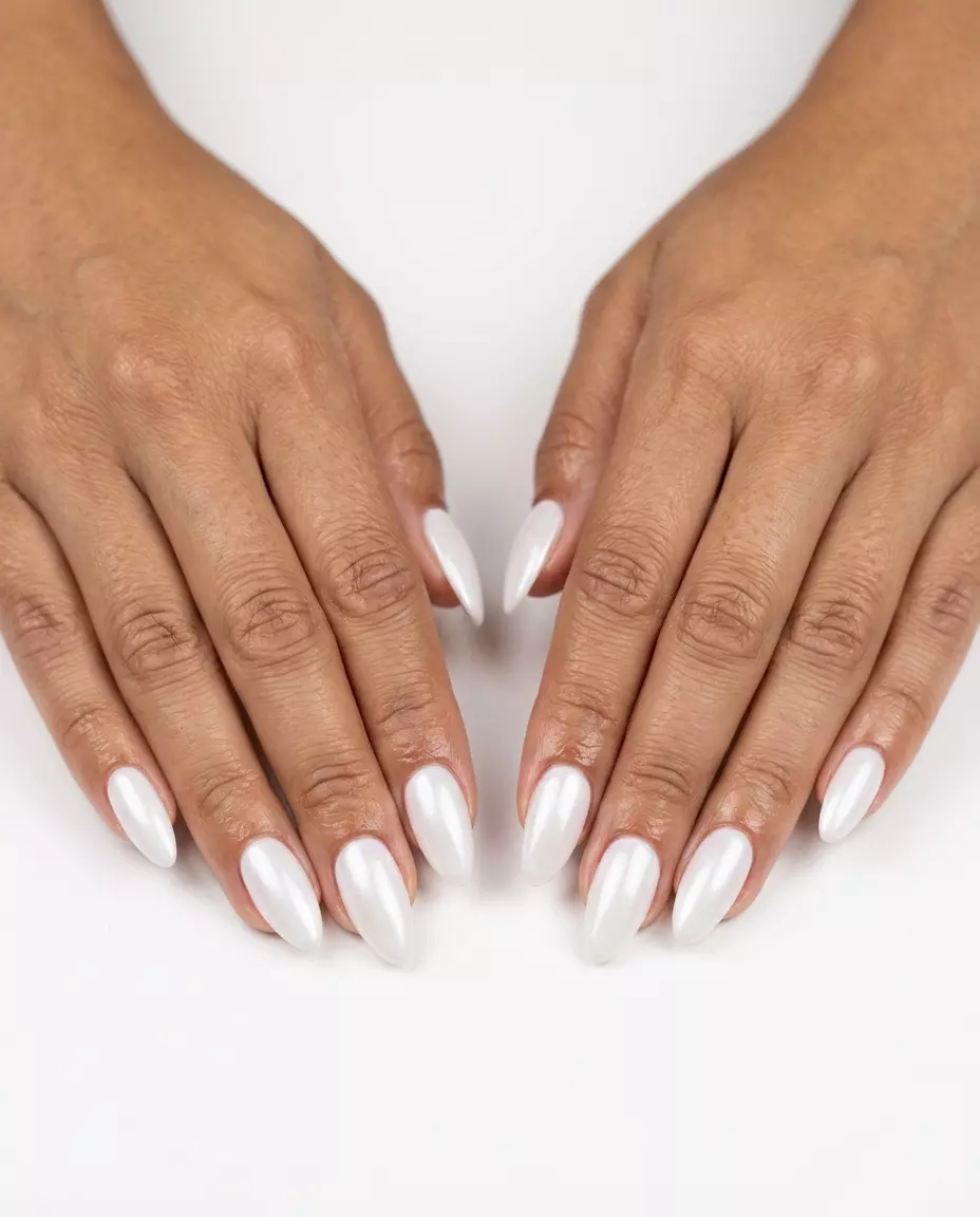 Sunlit Seafoam Shimmer Nails 2026 Sunlit Seafoam Shimmer nails for summer nails beach vibes 2026. Glamorous iridescent white shimmer on long almond nails.