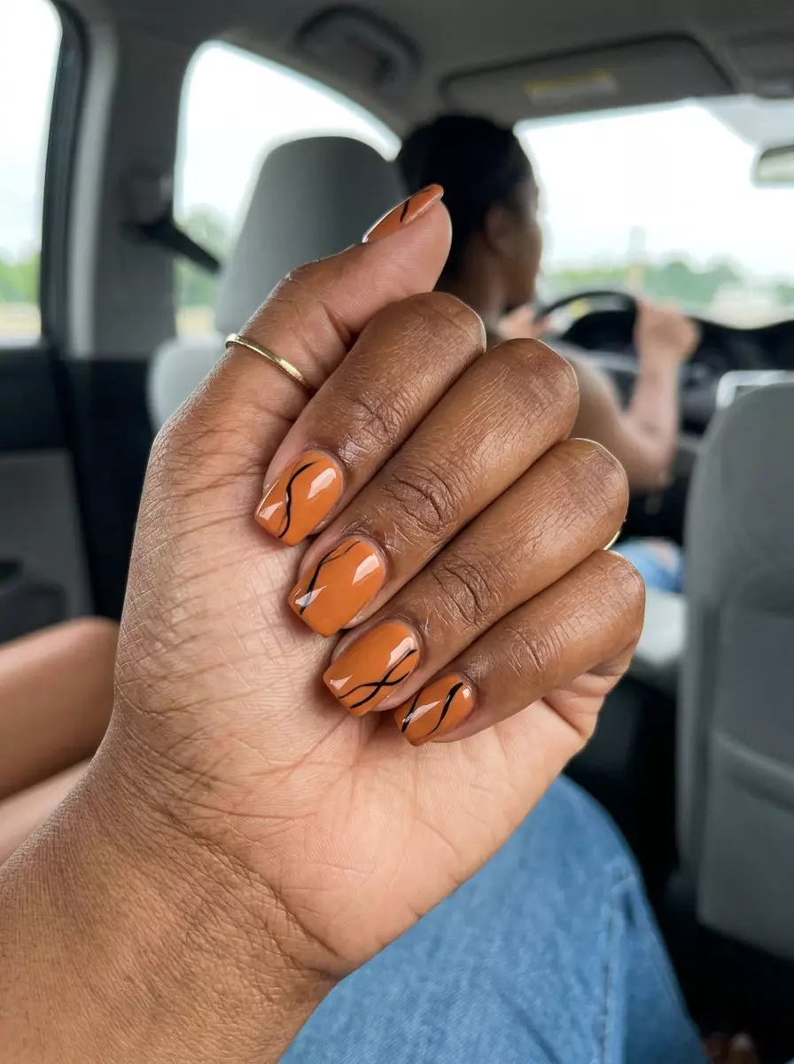 Burnt Orange Lines Nails 2026 | Artistic Summer Style Earthy abstract burnt orange lines nails for summer nails for brown skin tone 2026. Artistic & edgy, great for festivals.