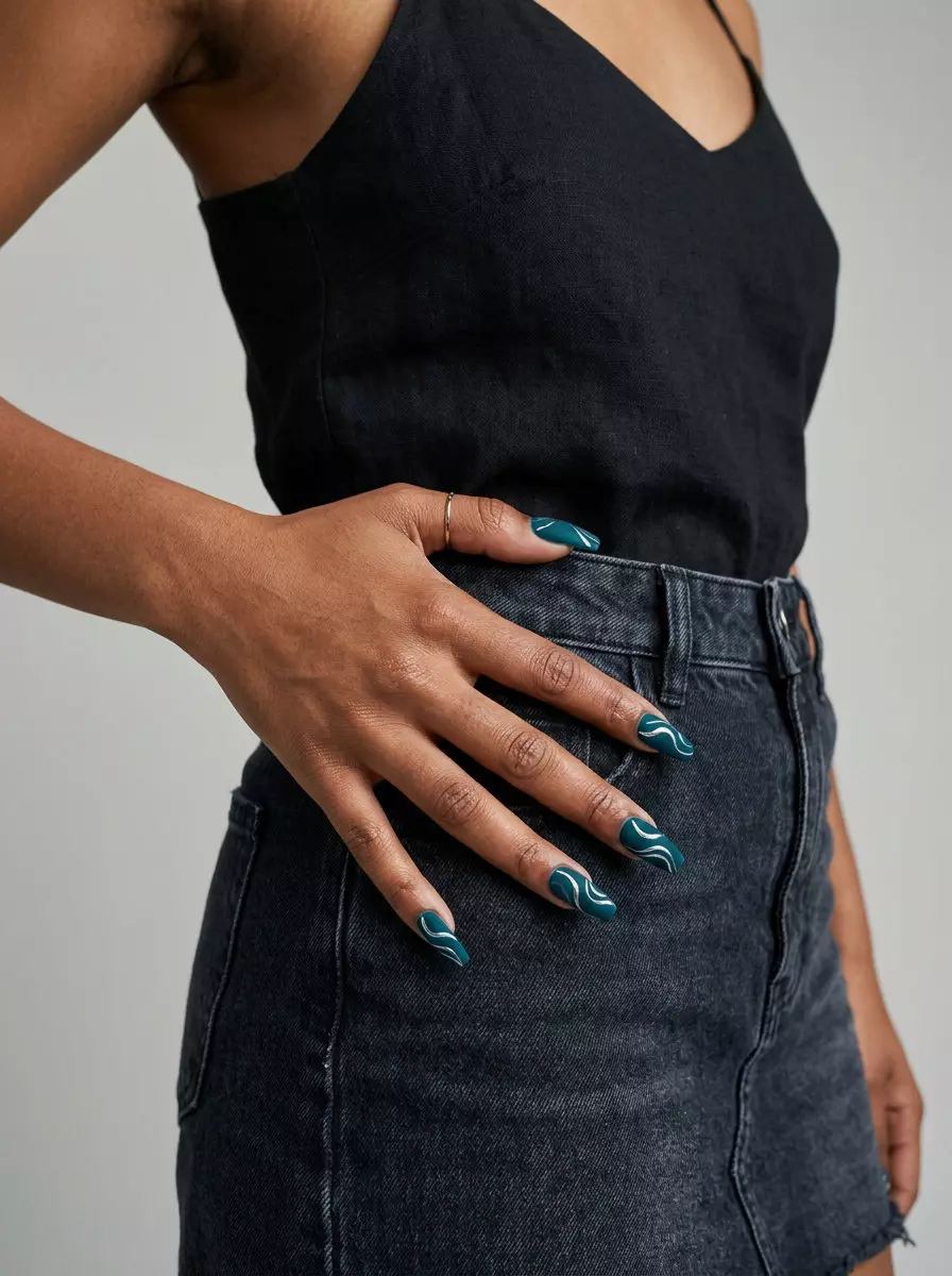 Deep Teal Velvet Swirls Nails 2026 Deep Teal Velvet Swirls nails for formal events, in deep teal with metallic silver swirls and a matte finish. Chic summer nails for brown skin tone 2026.