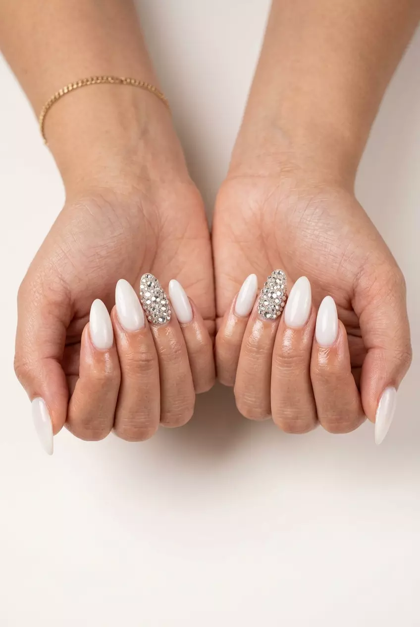 Glamorous Milky White Rhinestone Accent nails with opaque milky white base and clear rhinestones. Perfect for formal events.