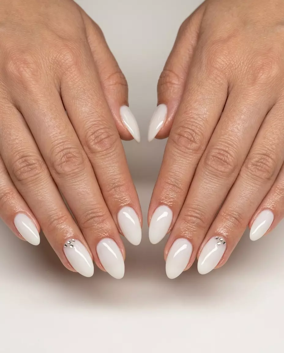 Sparkling rhinestone white nails for summer 2026. Glamorous, elegant look for parties & special events.