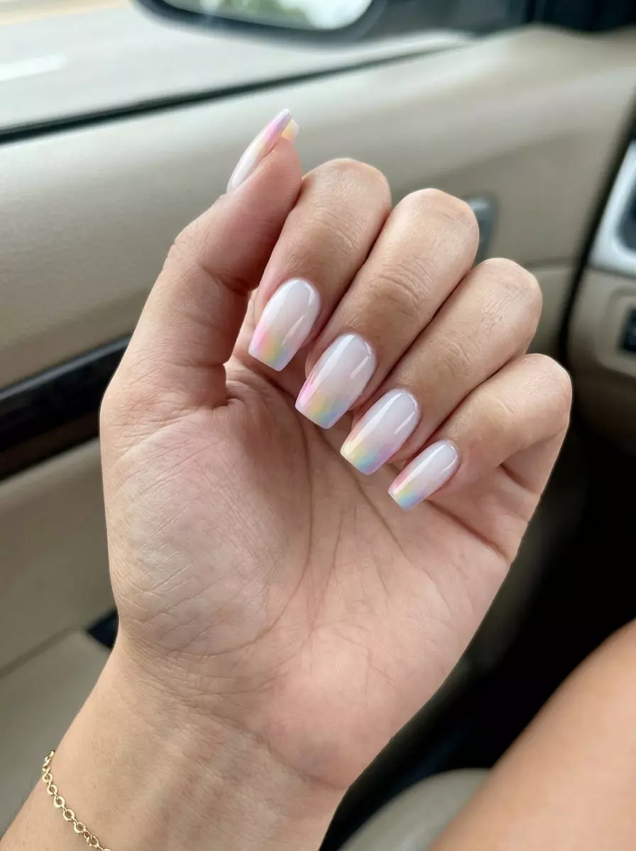 Sheer White Gradient Tip Nails 2026 | Minimalist Summer Style Sheer white gradient tip nails with pastel rainbow tips for summer rainbow nails 2026. Minimalist, romantic style.