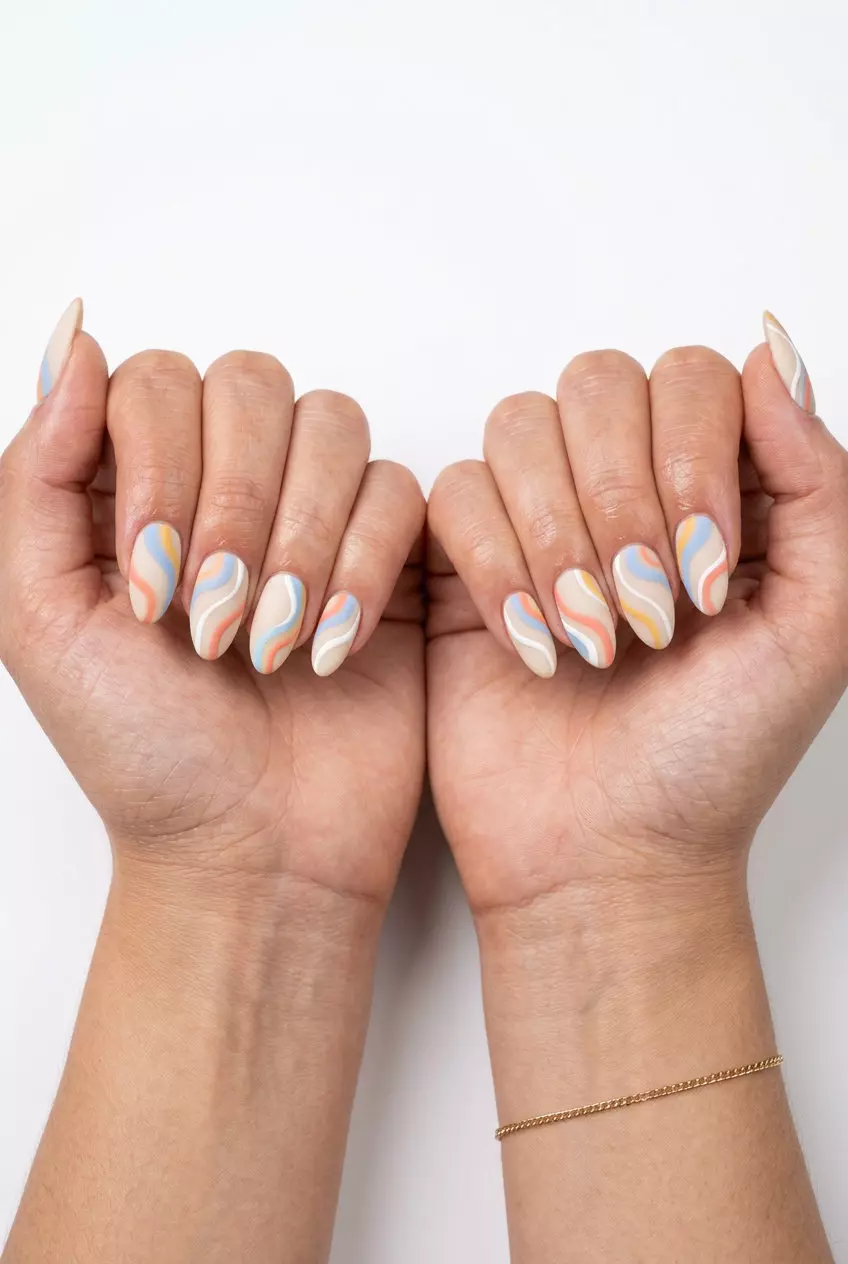 Abstract Swirls Matte Nails 2026: Vacation Style Abstract Swirls Matte Almond nails in pastel colors for trending summer nails 2026. Bohemian vacation outfit.